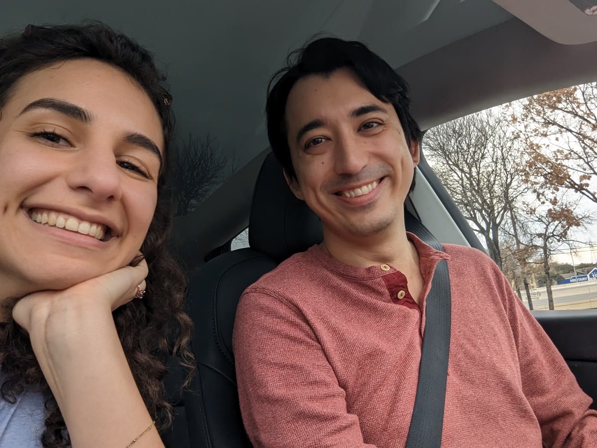 Laila and me in the car, smiling